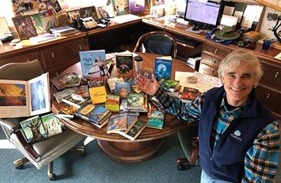 Tom Barron with his books