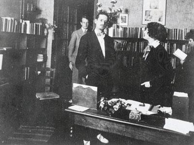 Writers John Rodker and James Joyce with Sylvia Beach at Shakespeare and Company.