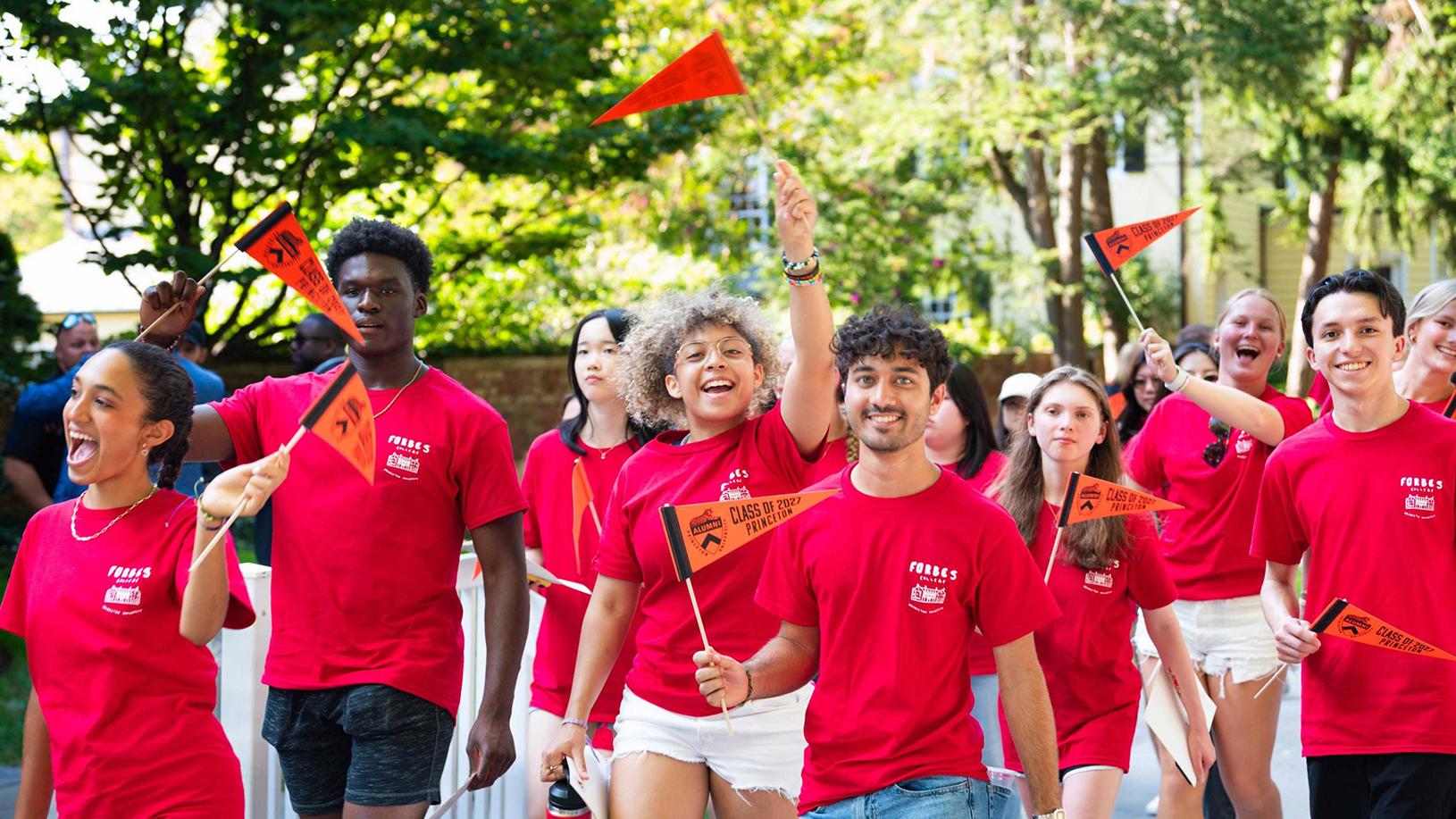 Enthusiastic students process in Pre-Rade