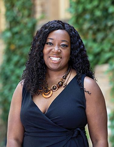 Alumna Sydney Montgomery in front of Nassau Hall