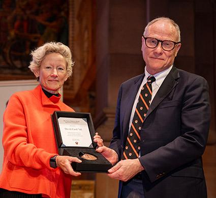 Weezie Sams presents the Madison Medal to David Card